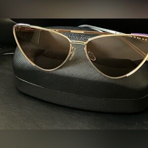 Salvatore Ferragamo Cat-Eye Sunglasses with Purple Accent